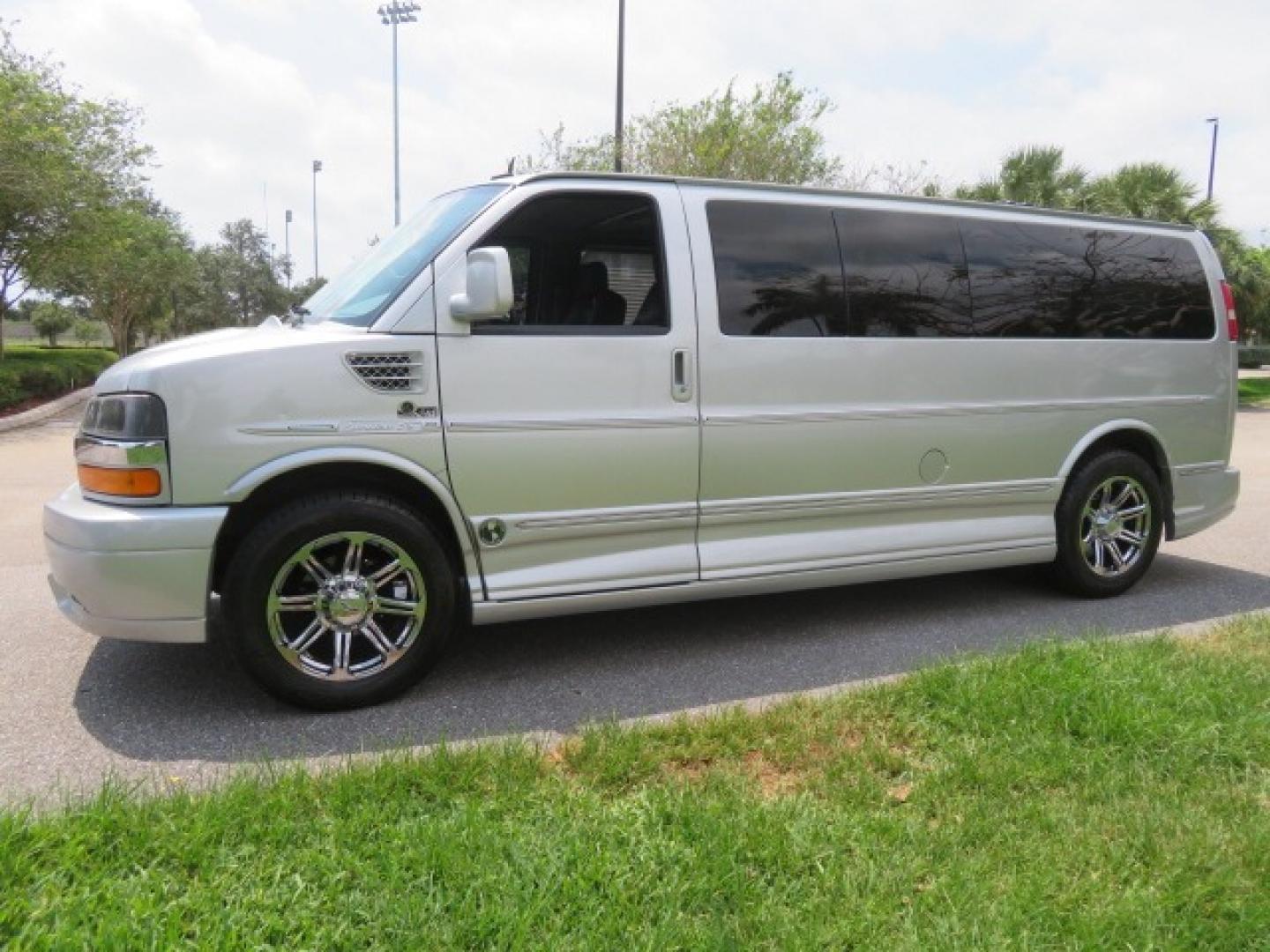 2014 Chevrolet Express (1GBWGLCG3E1) , located at 4301 Oak Circle #19, Boca Raton, FL, 33431, (954) 561-2499, 26.388861, -80.084038 - You are looking at a Rare 2014 Chevy Express 2500 Quigley 4x4 Four Wheel Drive Explorer Limited SE 9 Passenger Conversion Van with: 107K Original Miles, 6 Captain Chairs, Rear Power Folding Bench Seat Bed, Center Consoler Cooler, Front PPF (Paint Protection Film) Explorer Limited Conversion Througho - Photo#13